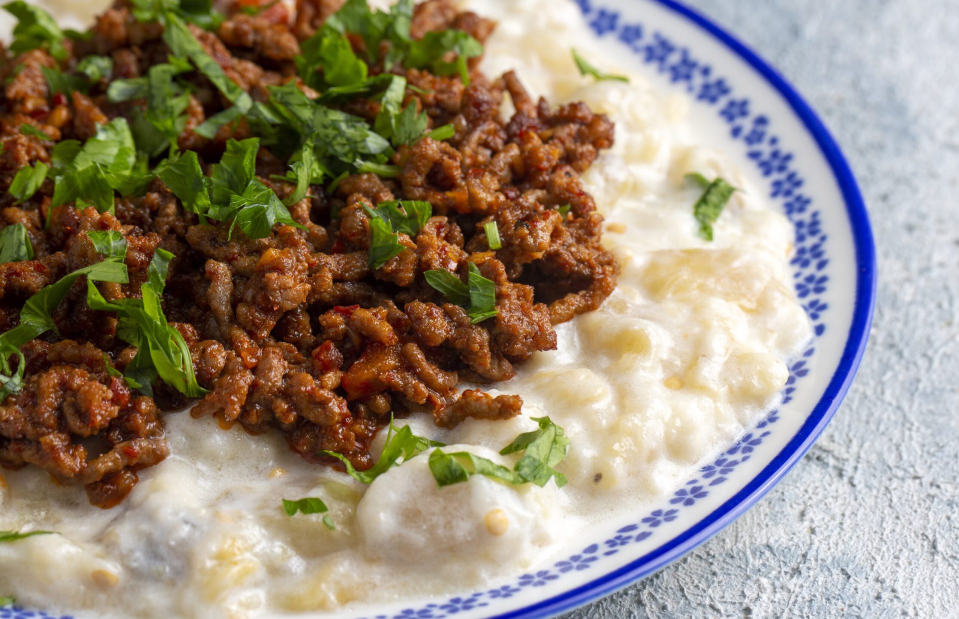 Turkish Ali Nazik Kebab with Yogurt, Minced Meat and Roasted Eggplant or Aubergine Kebap.